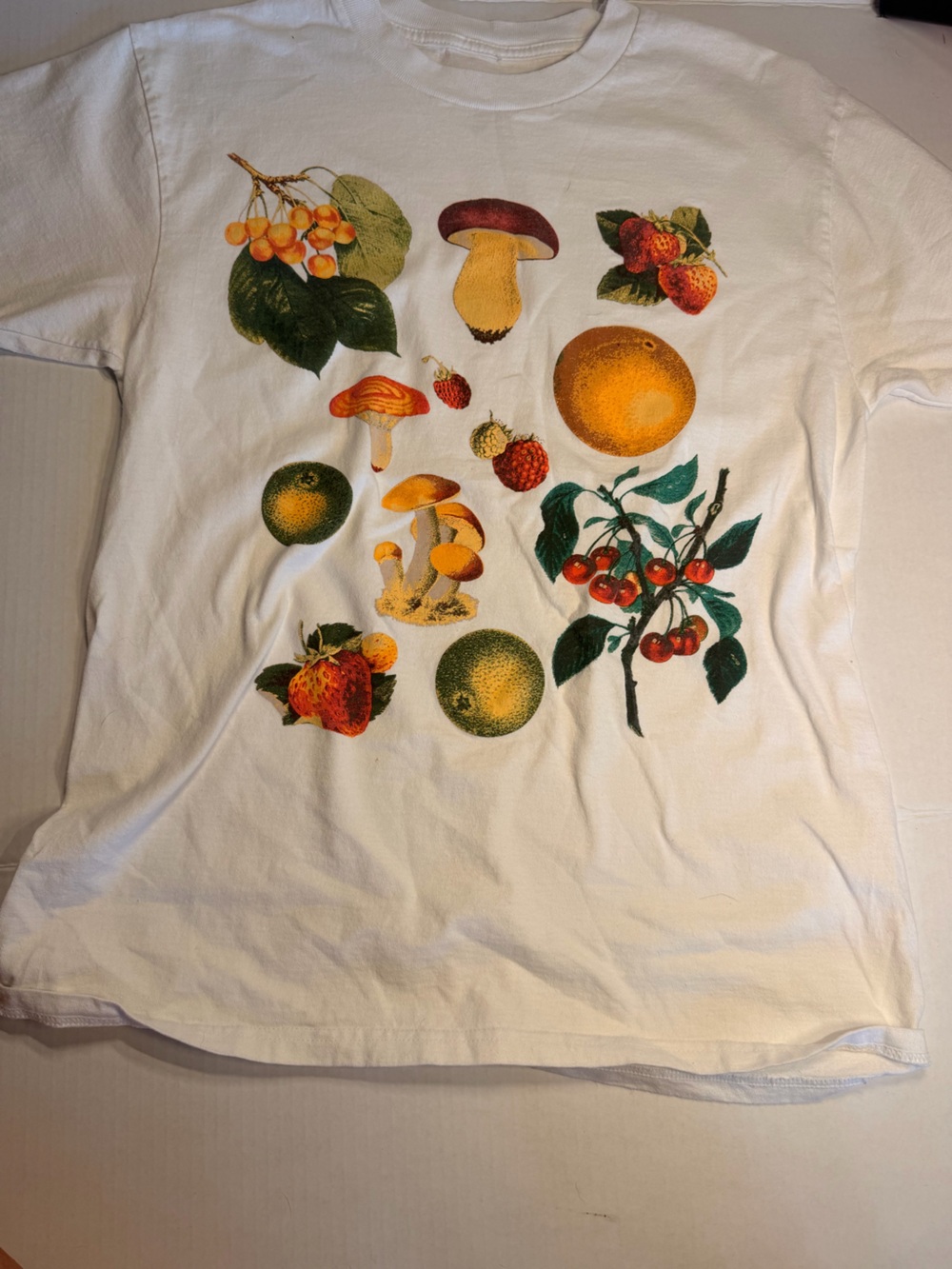Obey White T-shirt with Colorful Fruit & Mushroom Graphic
